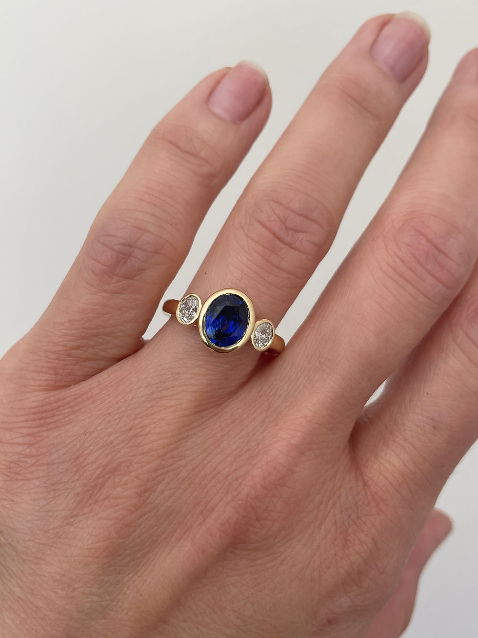 Thumbnail: Sold Oval Brilliant Sapphire Diamond Three Stone Yellow Gold Ring