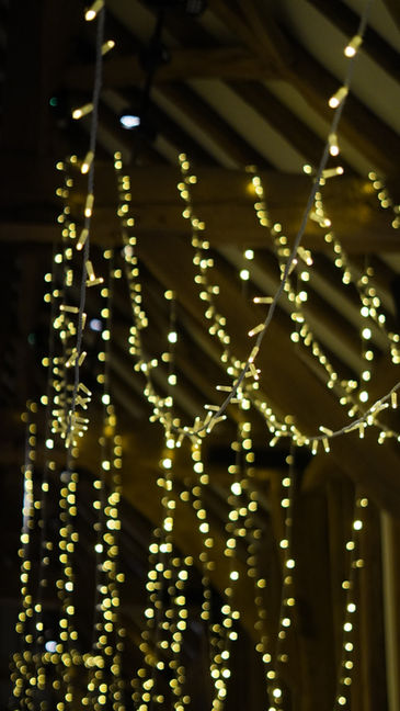 Elegant fairy lighting for evening wedding reception Windsor Berkshire