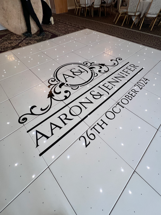 Personalised dancefloor monogram at a wedding