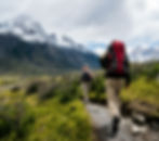 man hiking with backpack