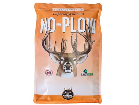 A Mature Whitetail Buck on a bag of Imperial Whitetail No-Plow Food Plot Seed