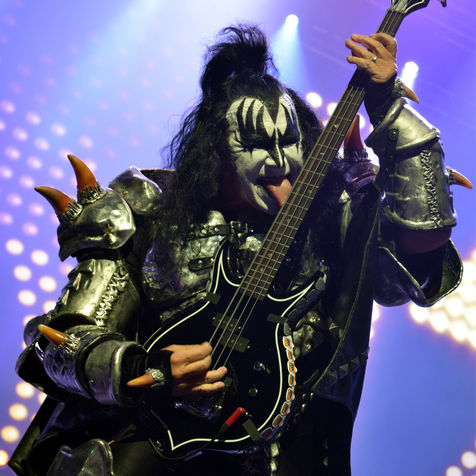 Gene Simmons of the band KISS onstage with his bass guitar