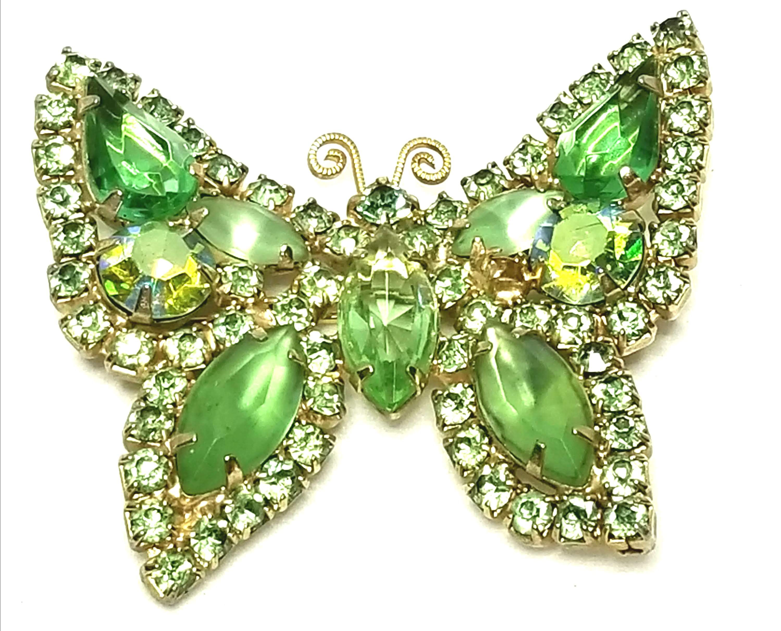 Designer by Weiss, brooch, butterfly motif, green stones/rhinestones, gold tone.