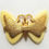 Thumbnail: Crown Trifari, butterfly pendant, creme and gold tone, 1 1/2 x 1 inches long.