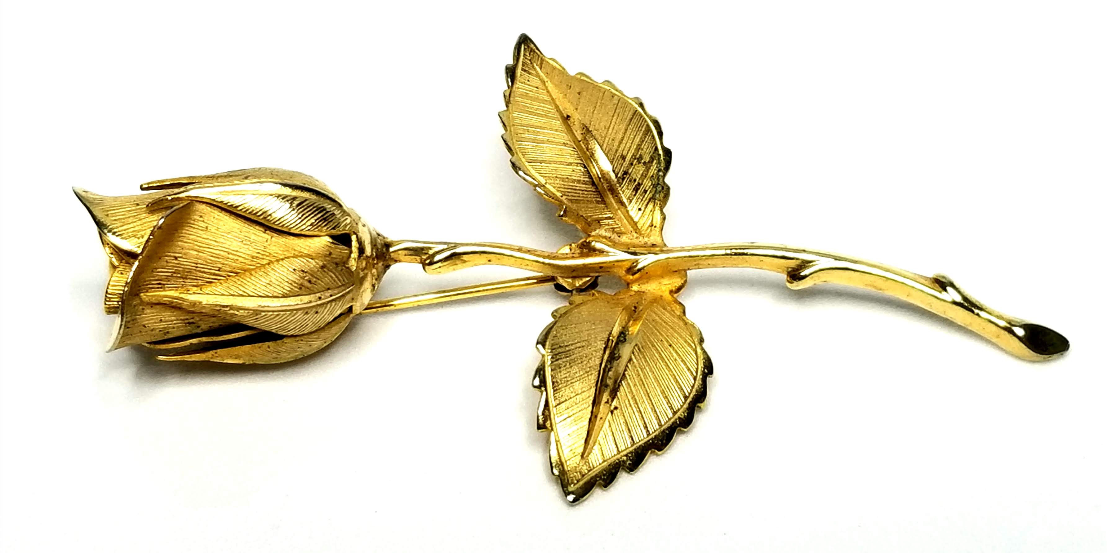 Designer by provenance, brooch, rose motif, gold tone, 3 inches.