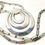 Thumbnail: Designer by Monet, necklace, silver tone pot metal circular pendant with chain.