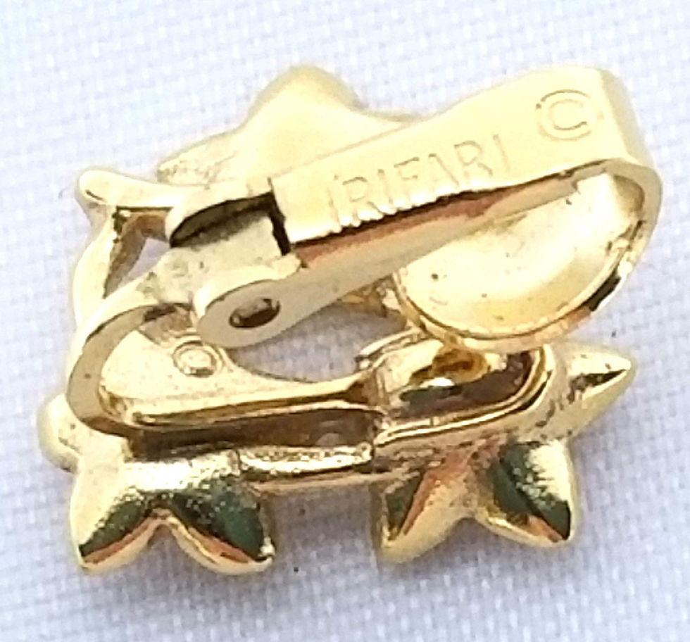 Thumbnail: Designer by Crown Trifari, earrings, clip on floral motif, gold tone pot metal.