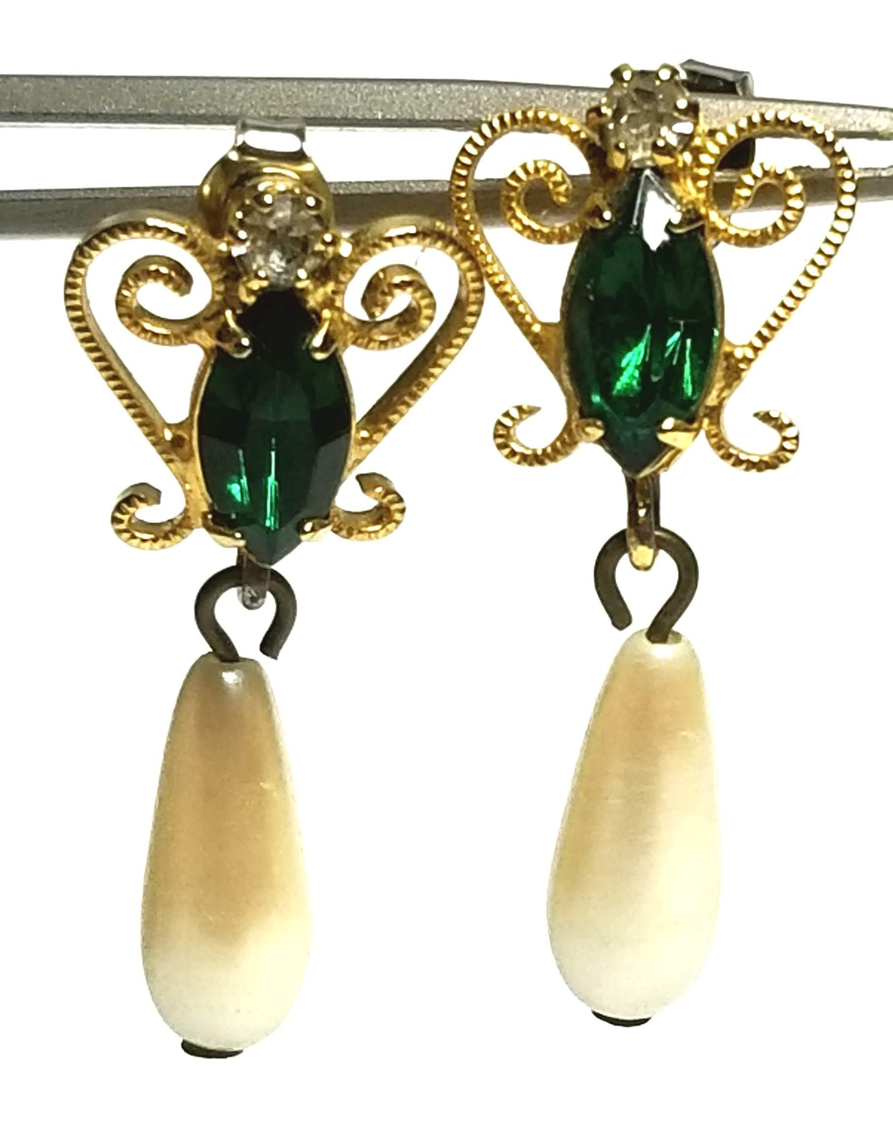 Designer by provenance, earrings, drops, green marquise stones with faux pearls.