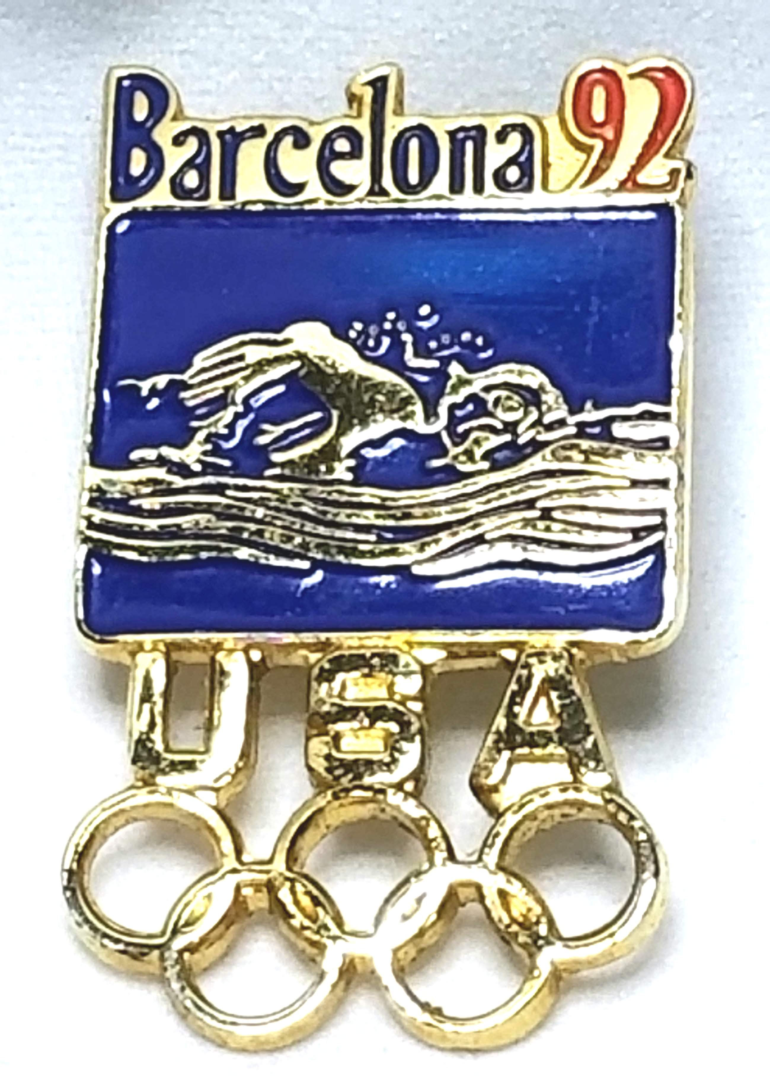 Designer by provenance, pin, 1992 Barcelona Olympics motif, 3/4 x 1 3/8 inch.