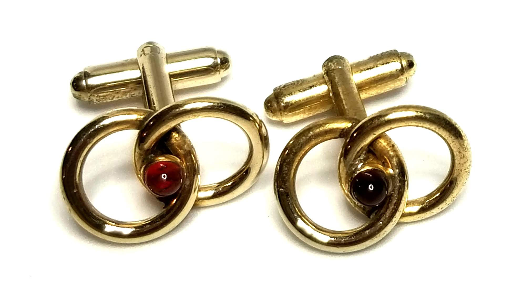 Designer by provenance, cuff links, red stones, gold tone, 3/4 inch.