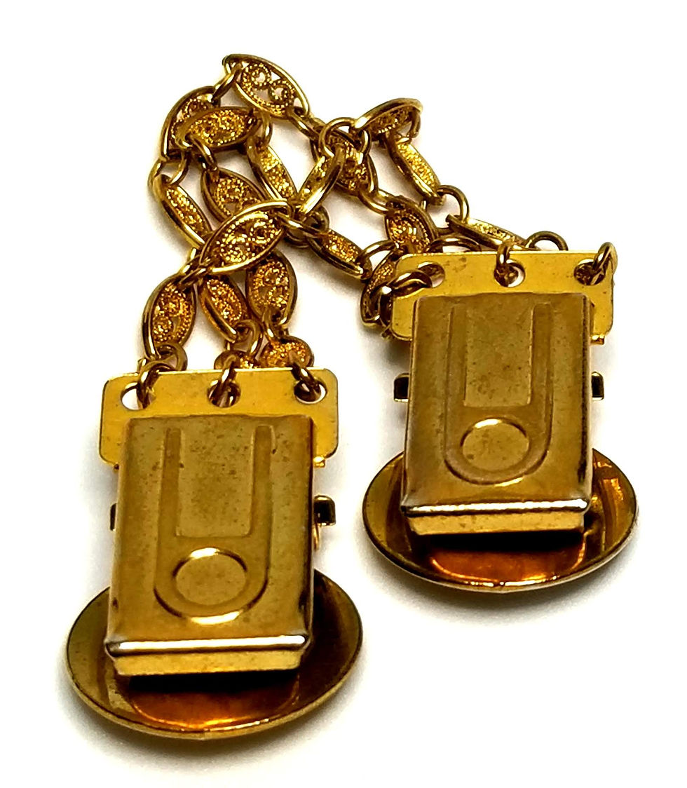 Thumbnail: Designer by provenance, sweater catch, round gold tone with filigree chain.