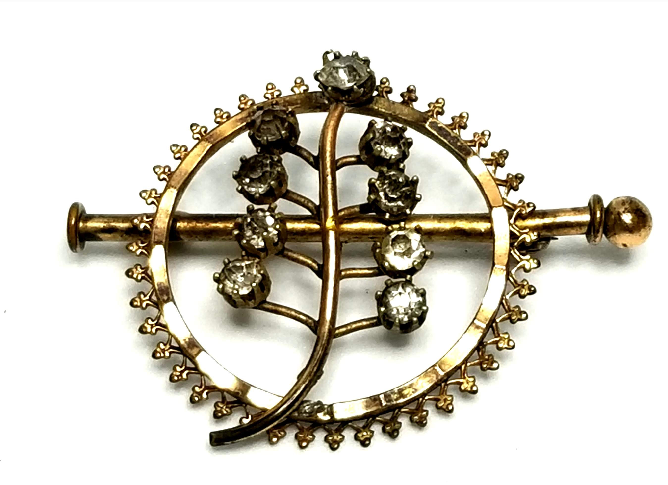 Designer by provenance, brooch, leaf motif, clear rhinestones, gold tone.