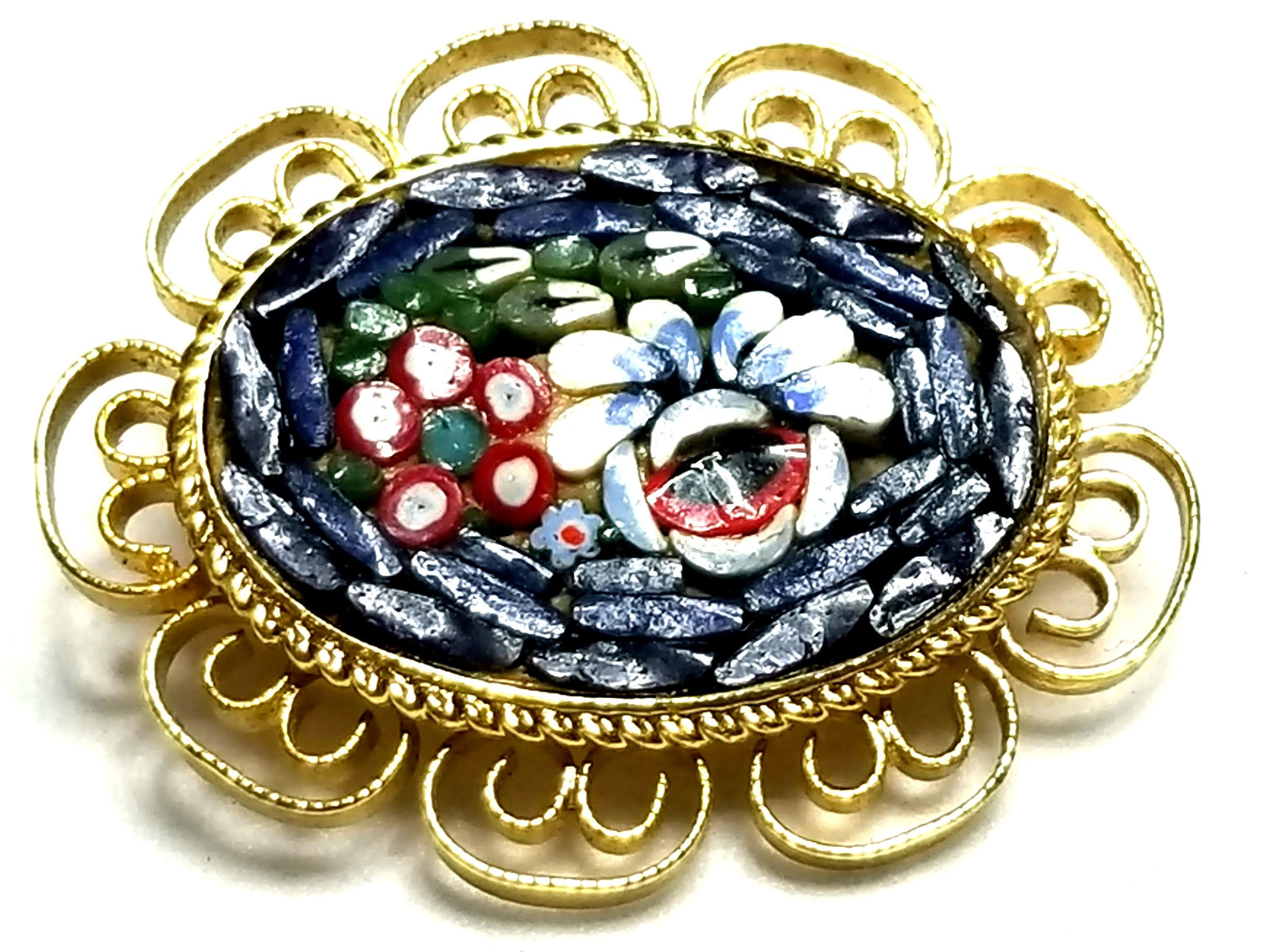 Designer by provenance, brooch, multi color micro-mosaic cut glass, gold tone.