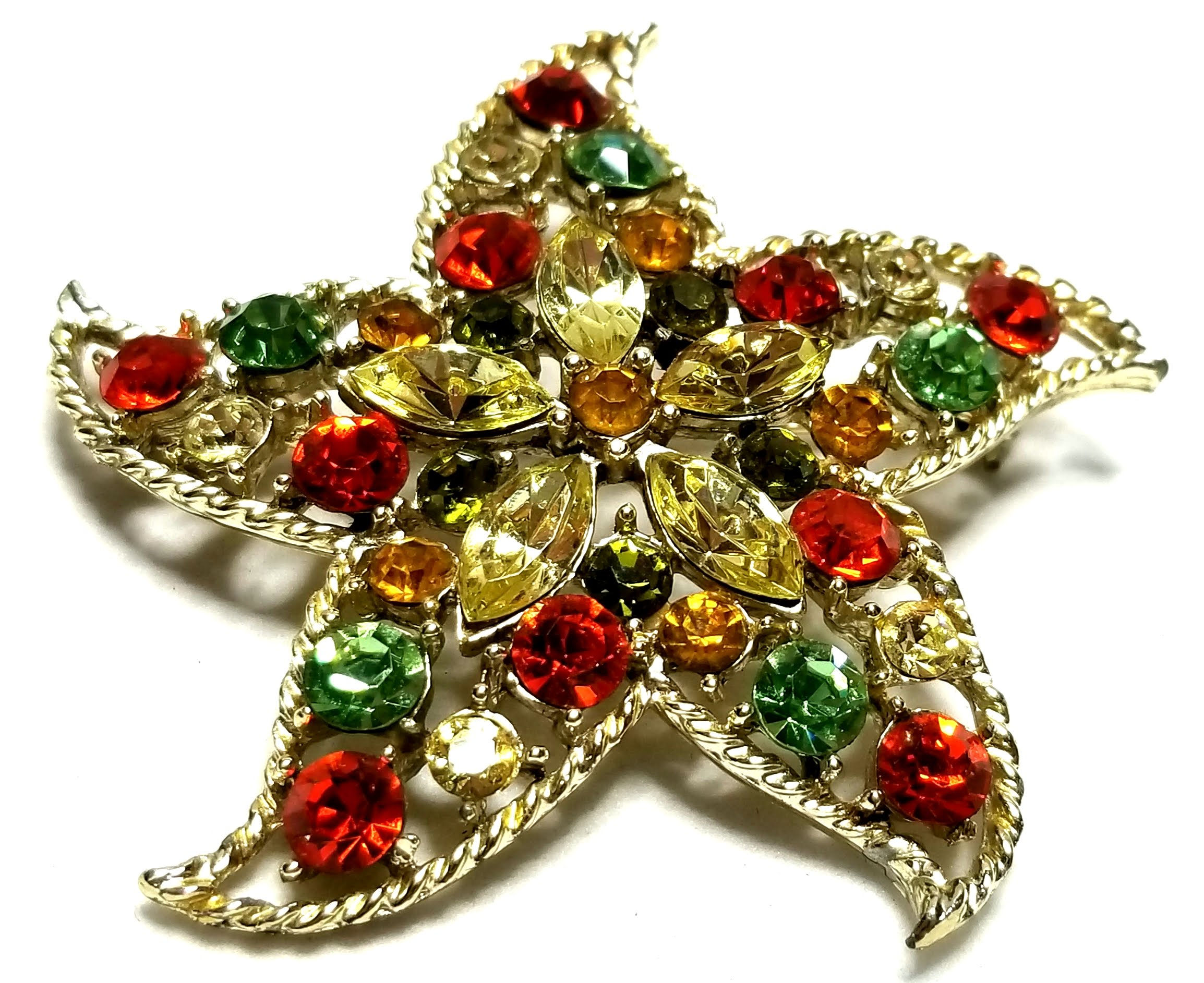 Designer by provenance, brooch, starfish motif, multi color rhinestones.