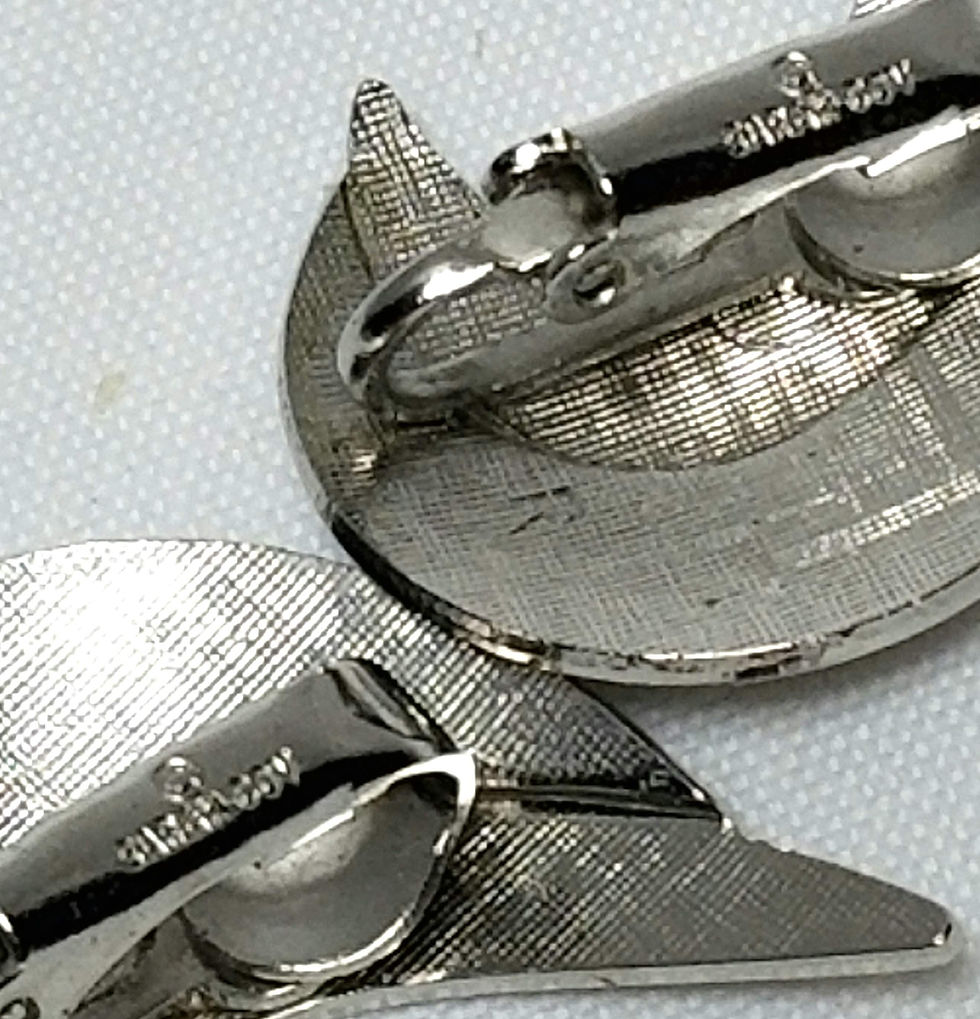 Thumbnail: Designer By Sarah Cov, earrings, clip on curved silver tone, 7/8 x 1 1/8 inch.