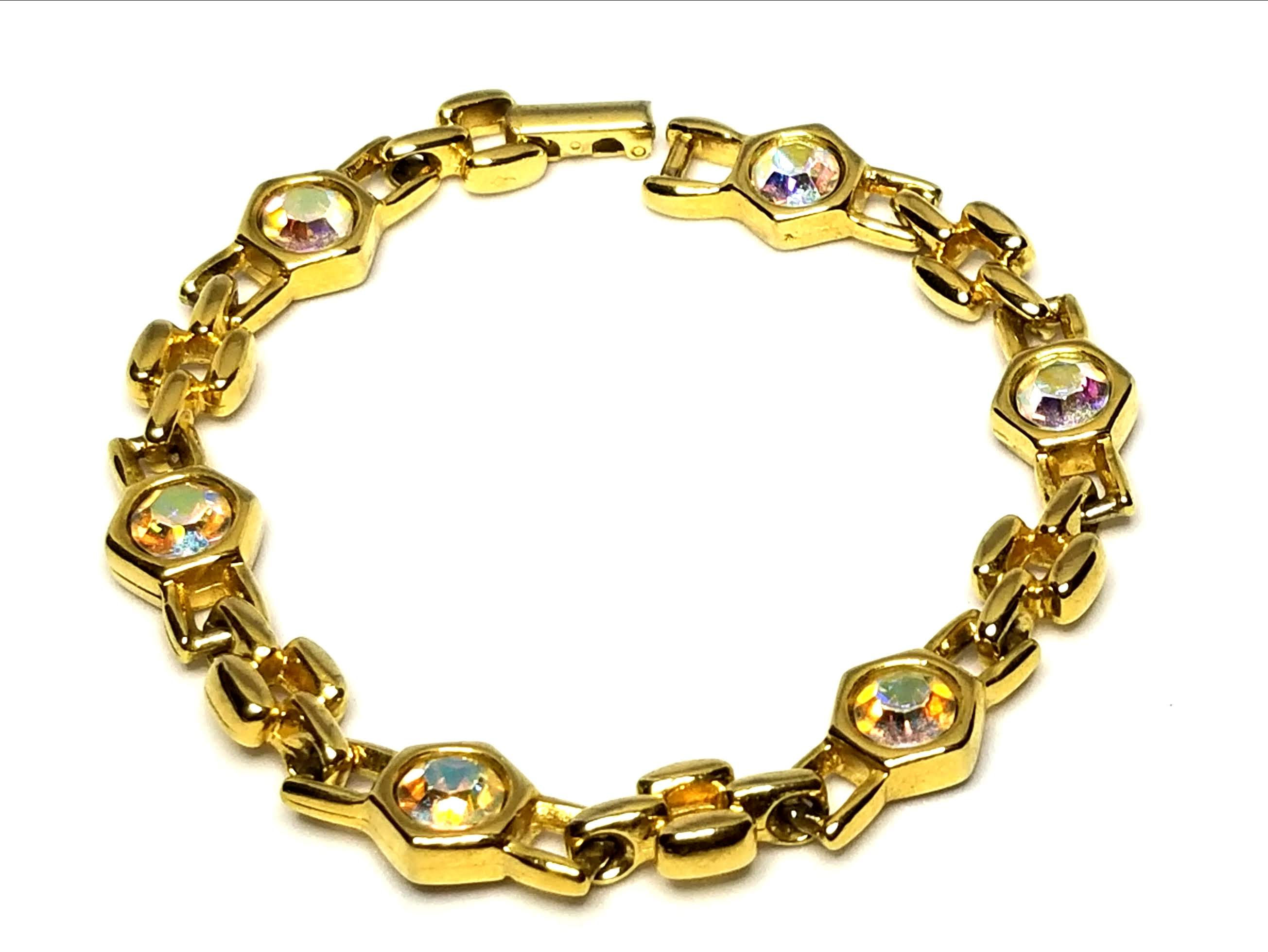Designer by provenance, bracelet, clear rhinestones, gold tone, 7 inches.
