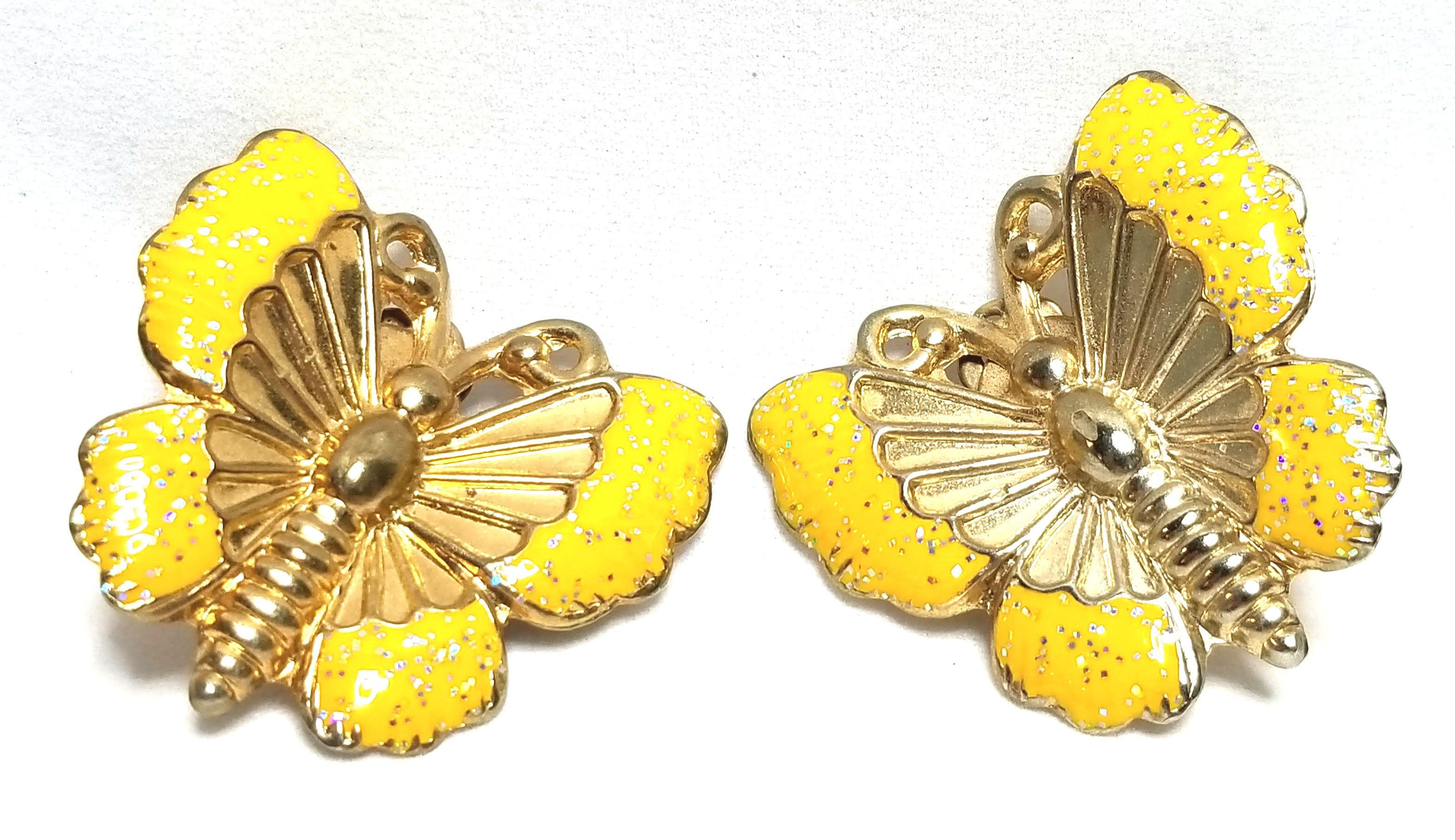 Designer by provenance, earrings, clip on butterfly motif, yellow and gold tone.