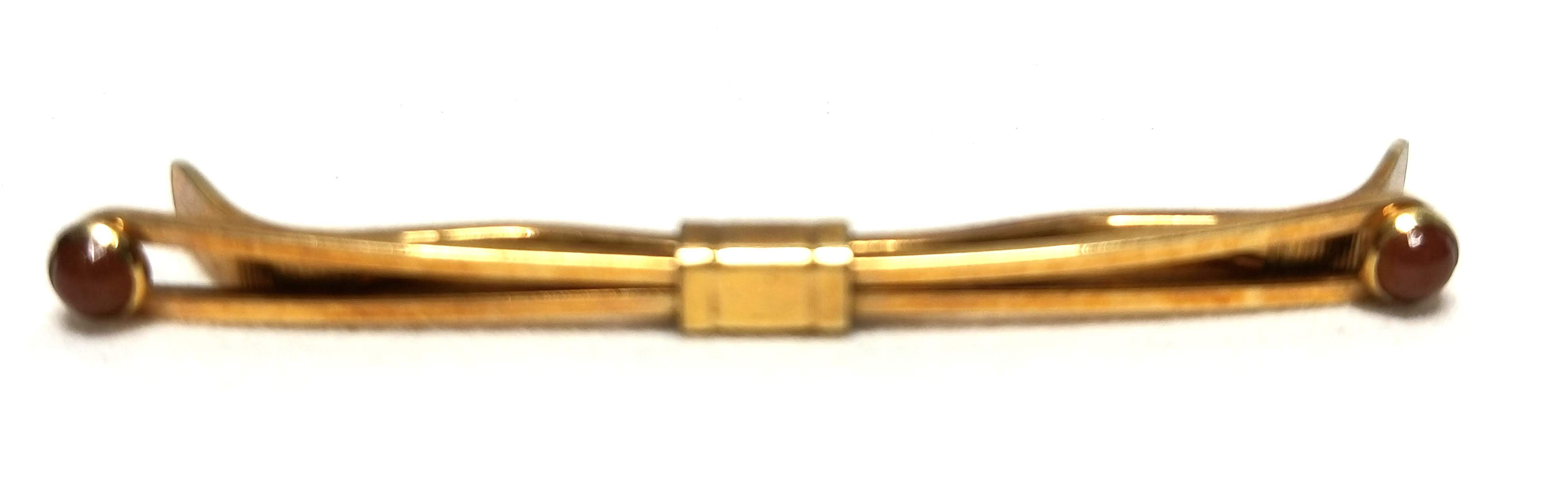 Designer by Krementz, collar clip, gold tone, 1 7/8 inches.