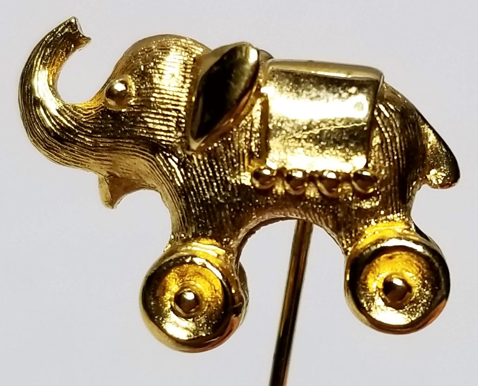 Thumbnail: Designer by Trifari Crown, stick pin, elephant motif in gold tone pot metal.