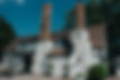The Butchers Arms pub: traditional building with tall chimneys