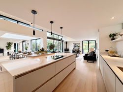 Sleek designer open plan kitchen Surrey Show Home