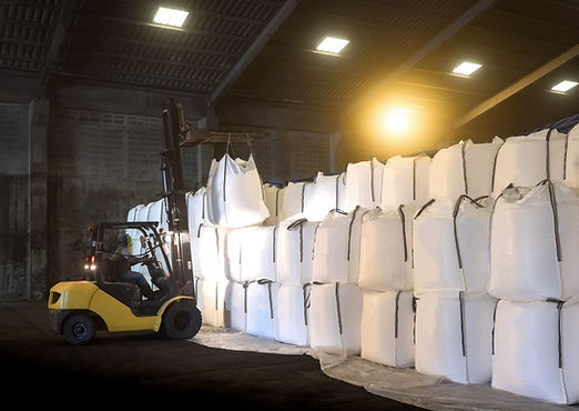 Soda ash in jumbo bags are store in warehouse and handling by forklift.jpg
