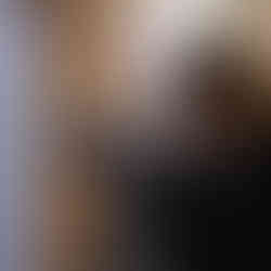 girl looking through telescope