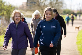 Woman walking with two poles