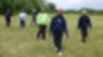 People walking with walking poles as part of the Nordic Walking group