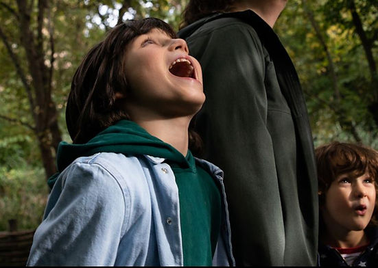 kids looking up at the sky