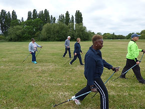 Image of people nordic walking with poles 