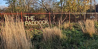 View of the Paddock sign