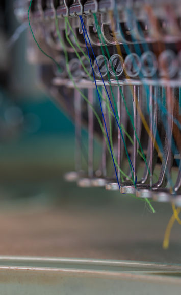 embroidery machine, embroidery, embroidery needles, embroidery thread, stitched logo