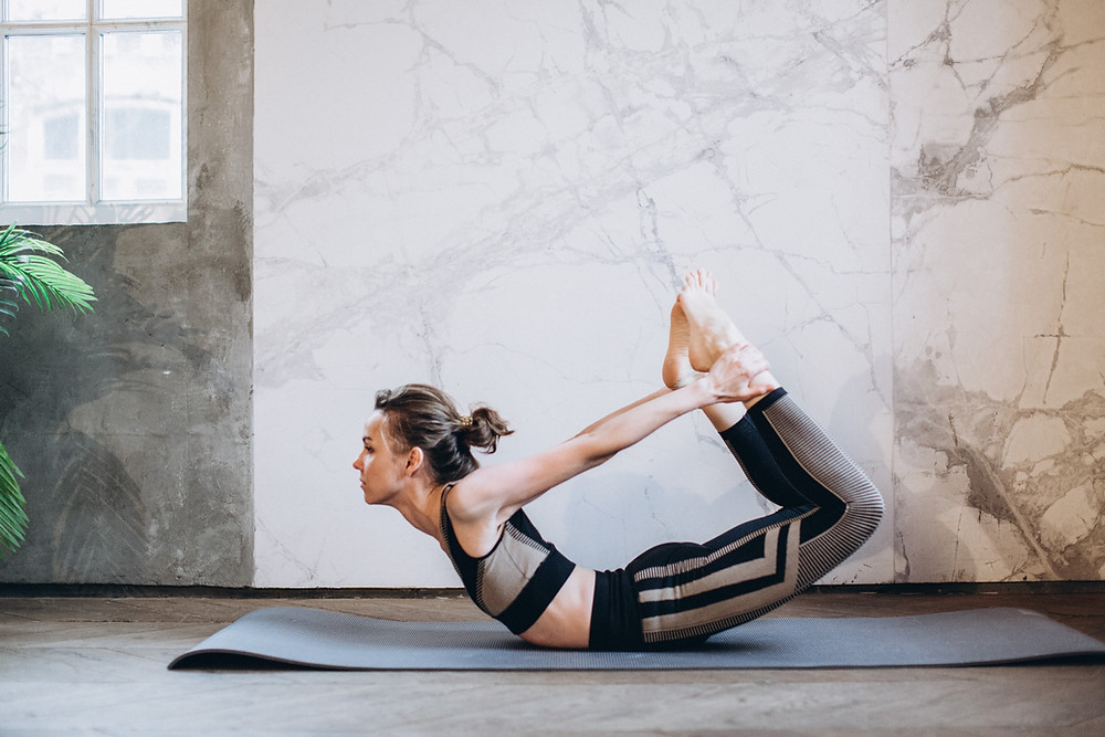 Dhanurasana the bow pose Yoga for PCOS PCOD