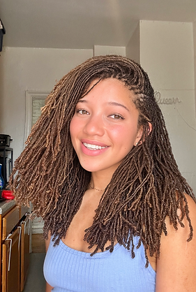 smiling Headhsot 7.2_edited.png