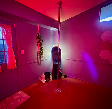 Red and blue lit creative filming room at Vortex 29