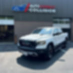 Autocorrect Collision Front of Shop with White Pickup Truck