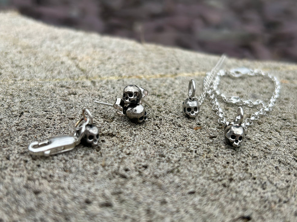 Thumbnail: Mini skull Lethe stud earrings