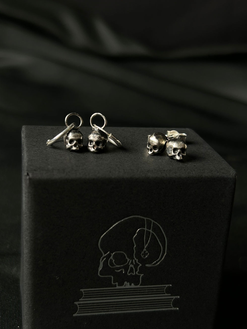 Thumbnail: Mini skull Lethe stud earrings