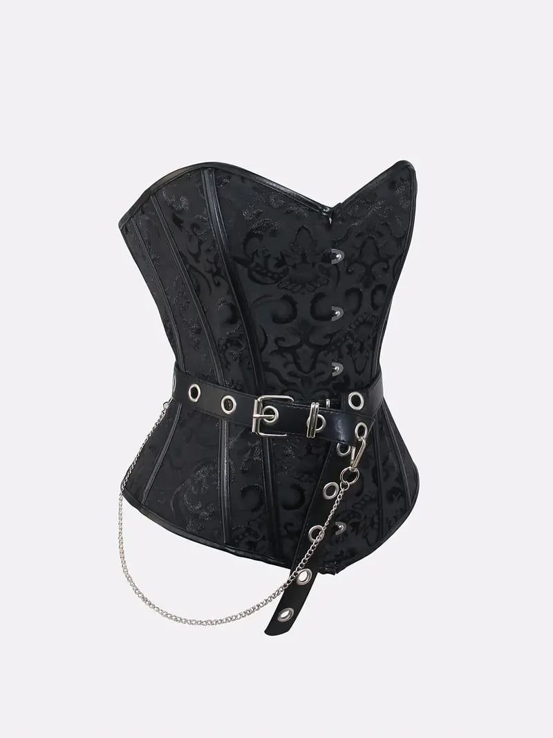 Black corset with glossy floral brocade, front busk closure, silver eyelet belt, and hanging chain detail,