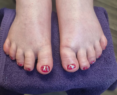 red gel polished toes
