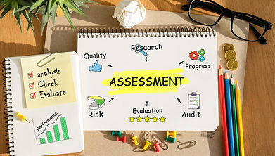 notebook-with-toolls-notes-about-assessment-concept.jpg