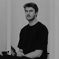 Portrait of Brazilian architect and designer Leonardo Zanatta, collaborator of Serafini, known for architectural marble design rooted in Latin American identity.