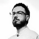 Portrait of Italian designer Marco Ravina, collaborator of Serafini, known for a material driven approach to marble design and craftsmanship.