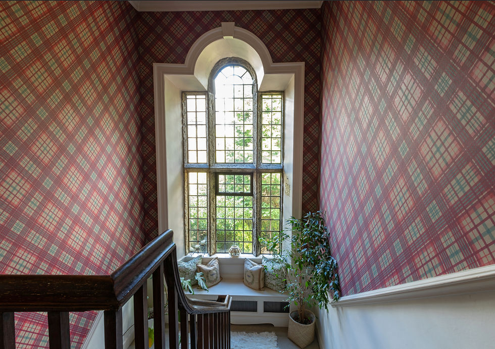 Staircase with landing window and tartan wallpaper