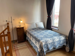 Upstairs bedroom; Secondary large single bed (120x190cm)