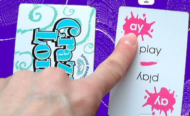 finger pointing to play card