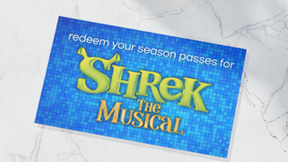 A bright blue card that says redeem your season pass for shrek the musical lays on a marble surface.