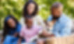 Parents%20and%20two%20kids%20sitting%20w