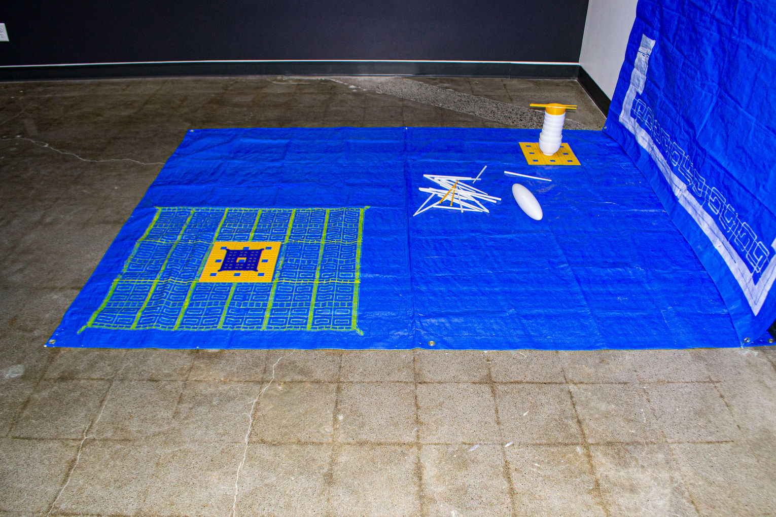 Just add oil; I feel cold. (Floor Tarp Detail), 2022, Polyethylene tarp, silkscreen, 3D printing